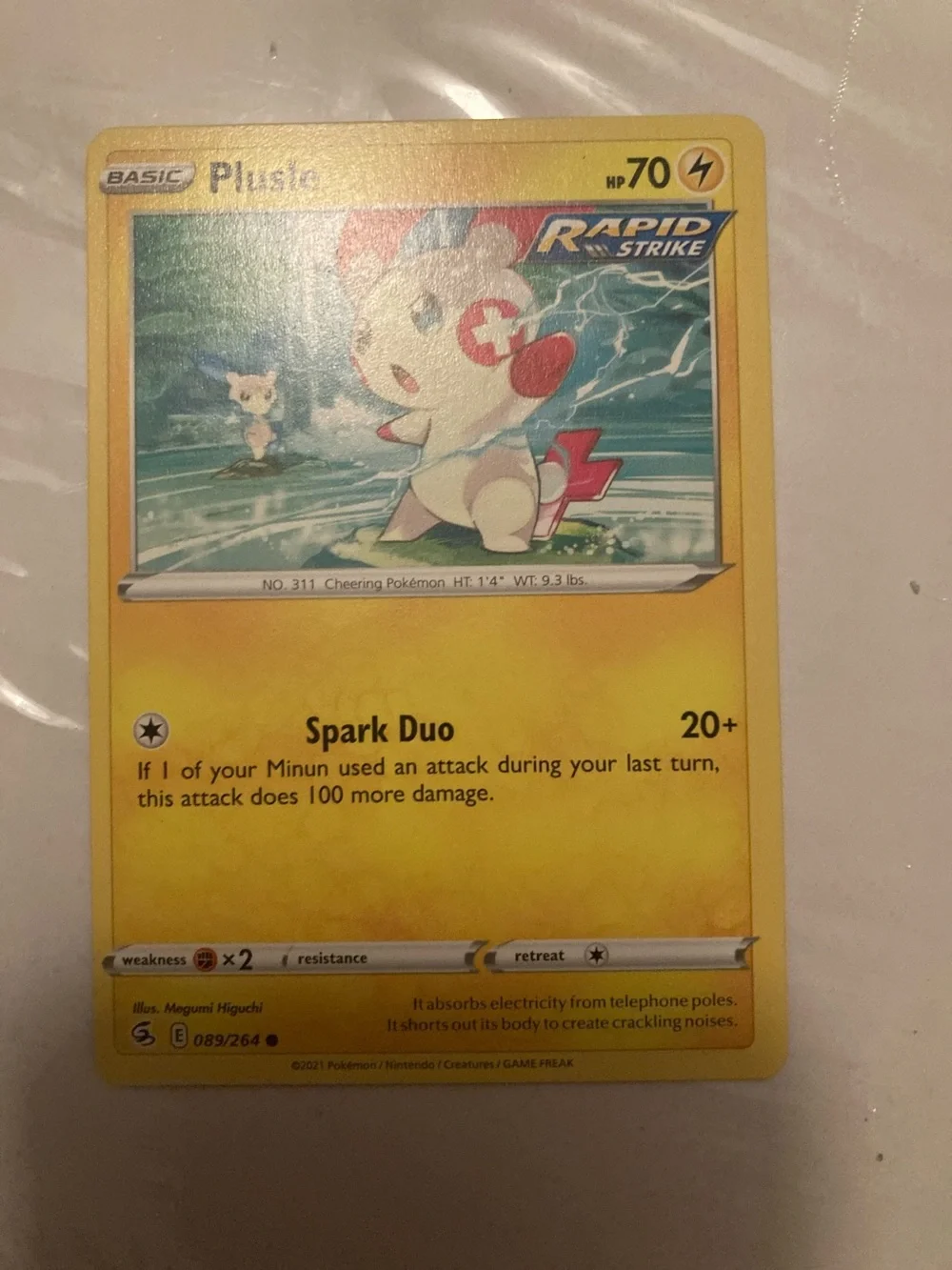 Pokemon Plusle Rapid Strike Card - Yellow
